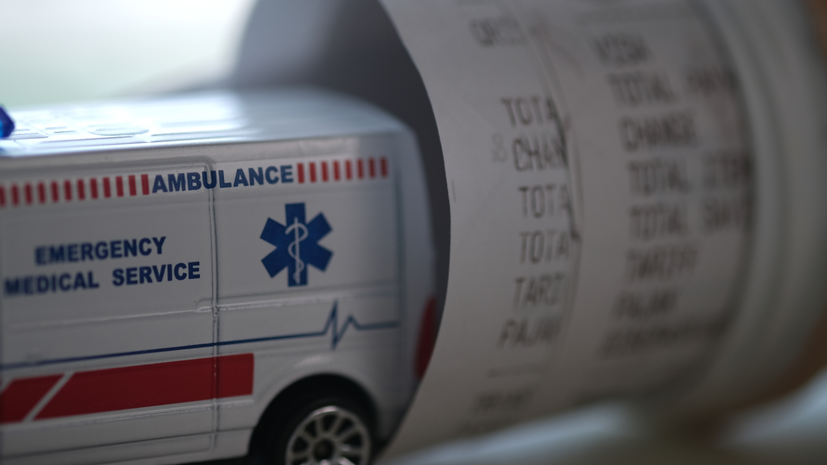 Hospital,Ambulance,Vehicle,With,Hospital,Bills,And,Medicines.