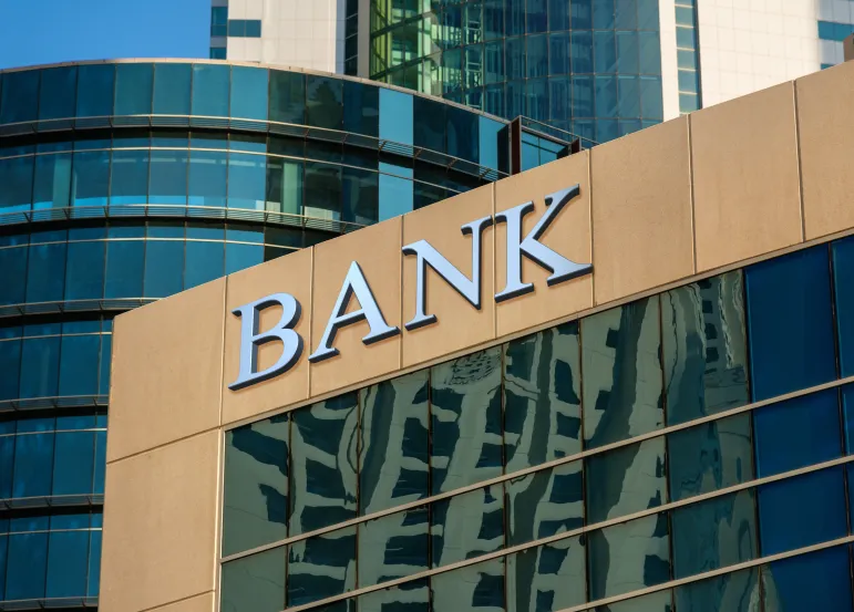 Bank,Sign,On,Glass,Wall,Of,Business,Center