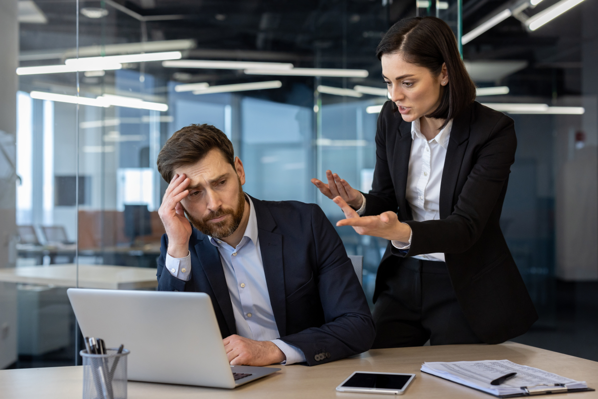 Conflicted,Office,Scene,Showing,An,Angry,Female,Boss,Yelling,At