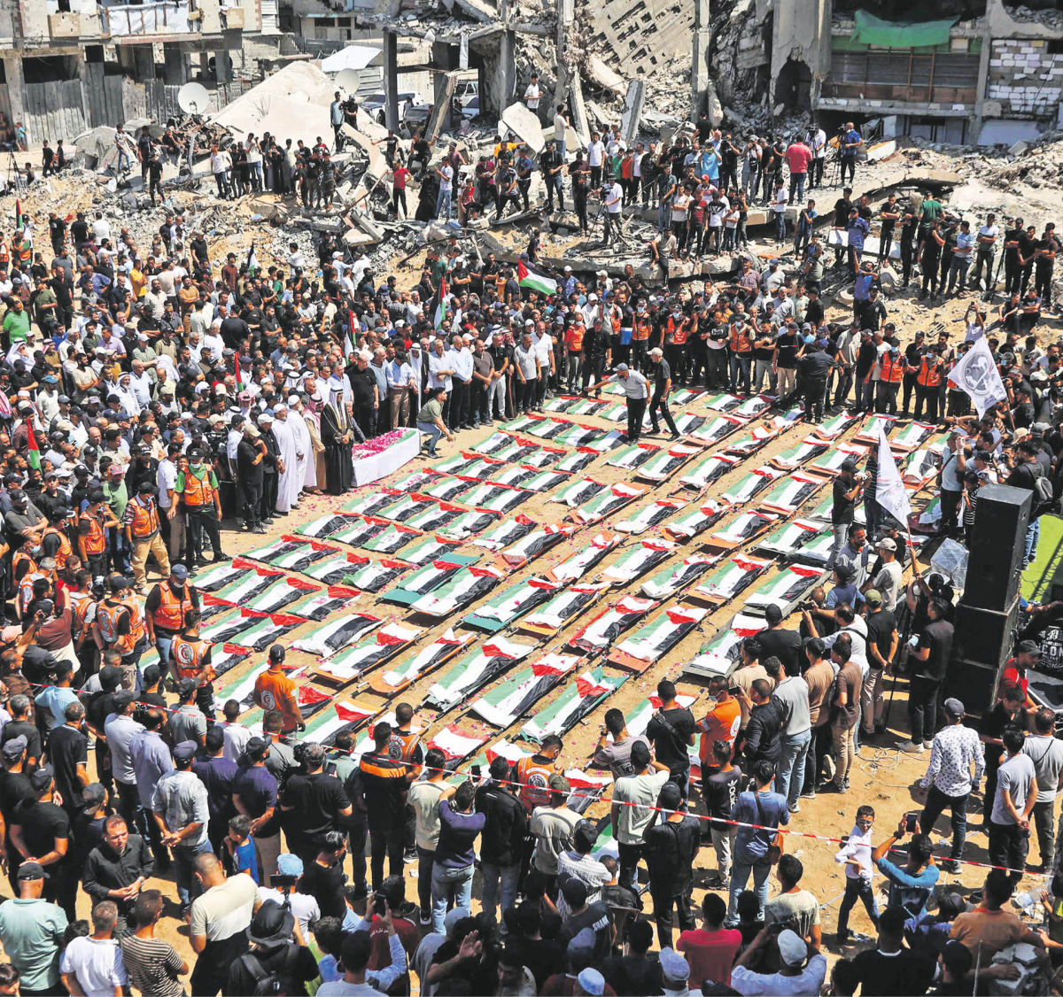 Pogrzeb członków rodzin Abu Szaria i al-Hasajna. Gaza, 4 sierpnia 2026 r.