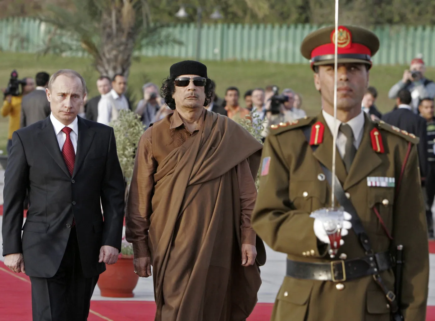 Władymir Putin i Muammar Kadafi