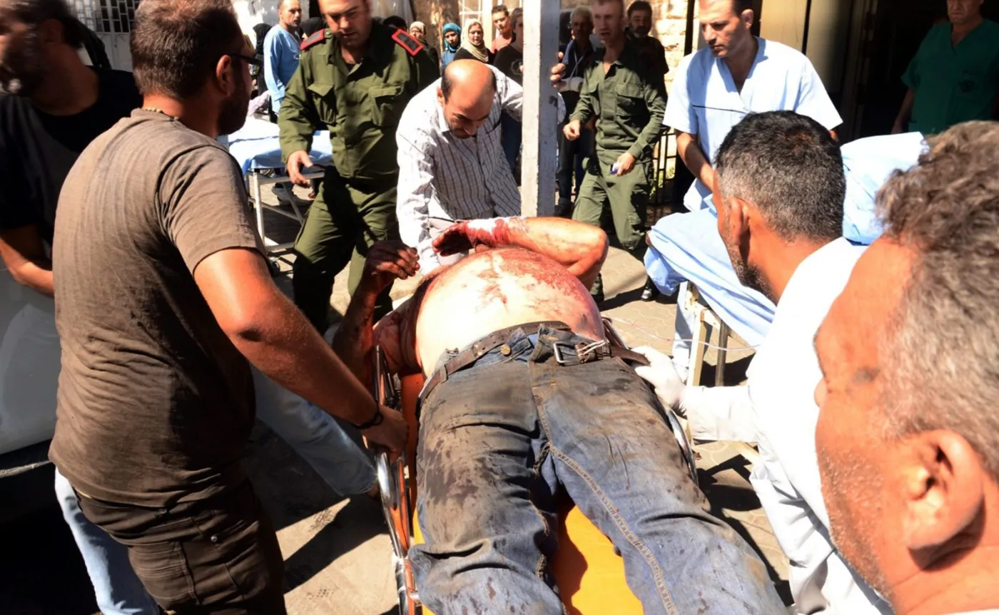 Ranni po bombardowaniu w Aleppo