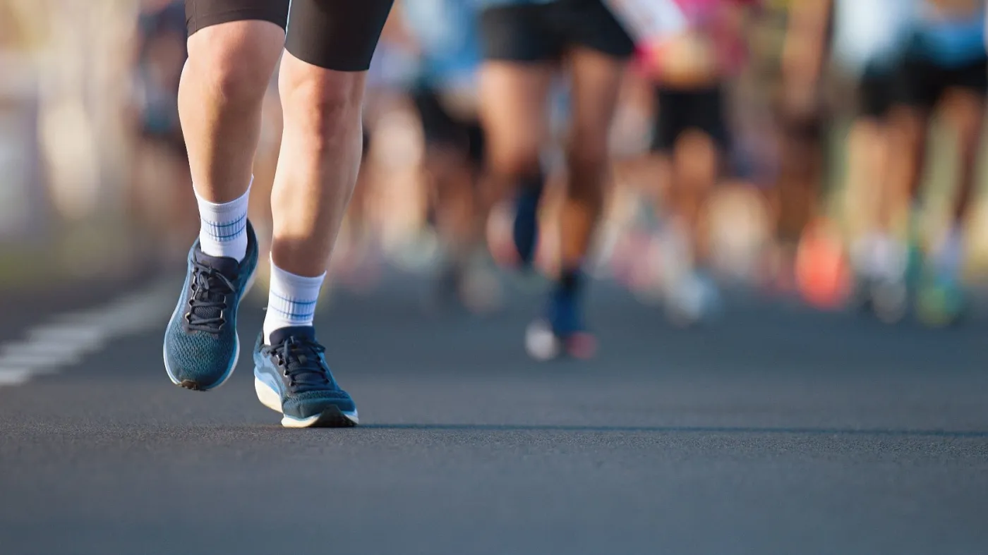 Marathon,Running,Race,,People,Feet,On,City,Road,,Runners,Run