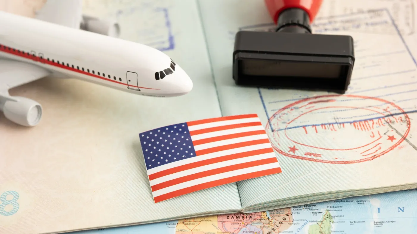 Approved,Stamp,Visa,And,Passport,With,Us,Flag,Document,To