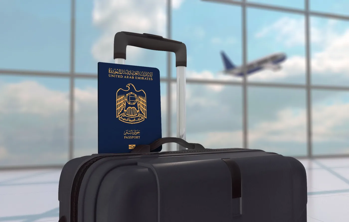 United,Arab,Emirates,Passport,On,A,Black,Luggage,Bag,And