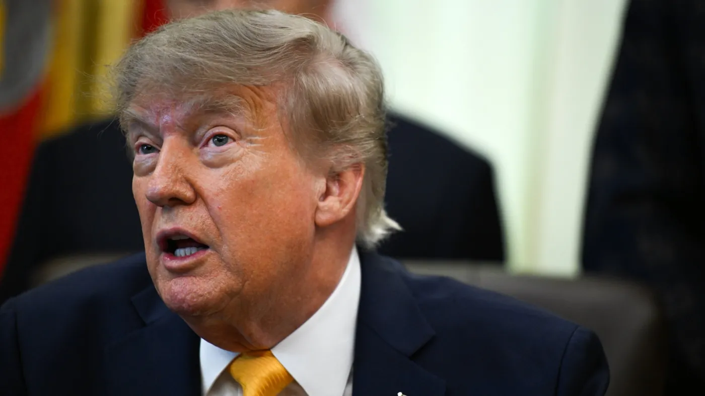 US President Donald Trump signs executive order at the White House