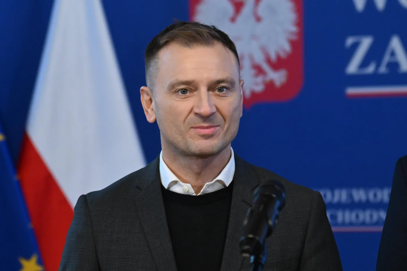 Minister sportu i turystyki Sławomir Nitras trener pływania Mirosław Drozd