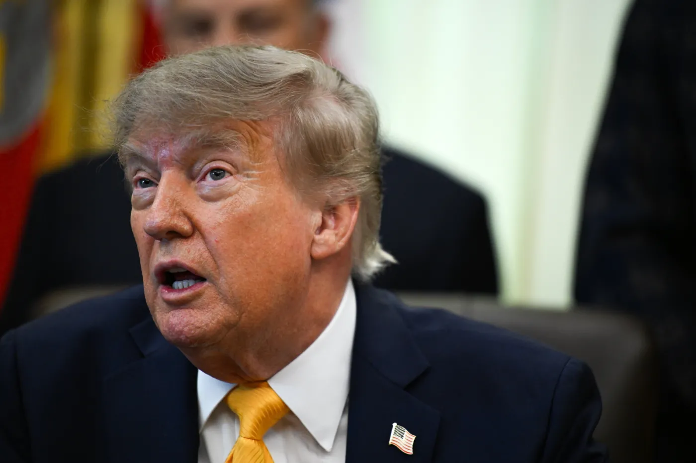 US President Donald Trump signs executive order at the White House