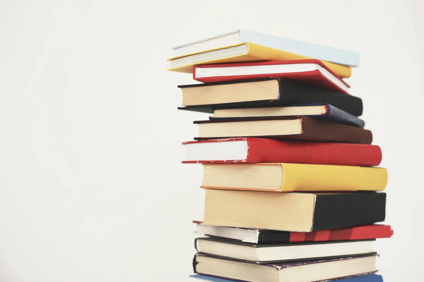 Stack,Of,Books,On,White,Background