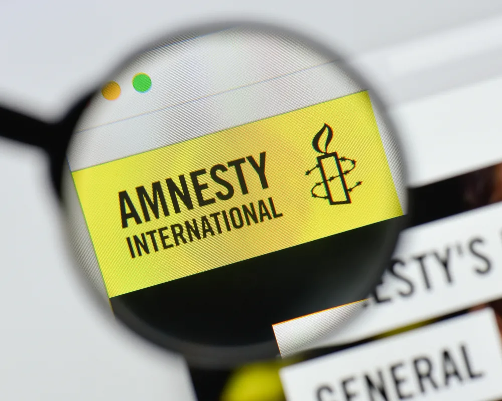 Podolak: Amnesty International uczestniczy w rosyjskiej kampanii dezinformacyjnej