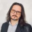dr Paweł Szczęsny psycholog i bioinformatyk zajmujący się badaniem interakcji człowiek - konwersacyjne systemy sztucznej inteligencji