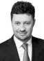 radca prawny w zespole prawa zamówień publicznych kancelarii Dentons, członek Głównej Komisji Orzekającej w Sprawach o Naruszenie Dyscypliny Finansów Publicznych, były członek Krajowej Izby Odwoławczej