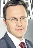 Rybiński: Demokracja i obywatele sterowani przez matrix