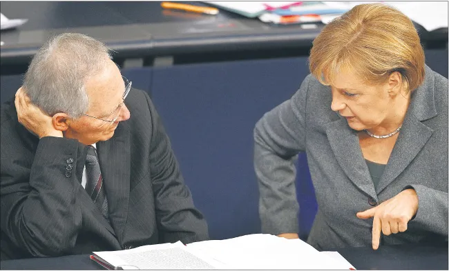 Do niemieckich propozycji przekonują minister finansów Wolfgang Schaeuble i kanclerz Angela Merkel
