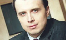 Michał Grzybowski, dyrektor w Ernst & Young