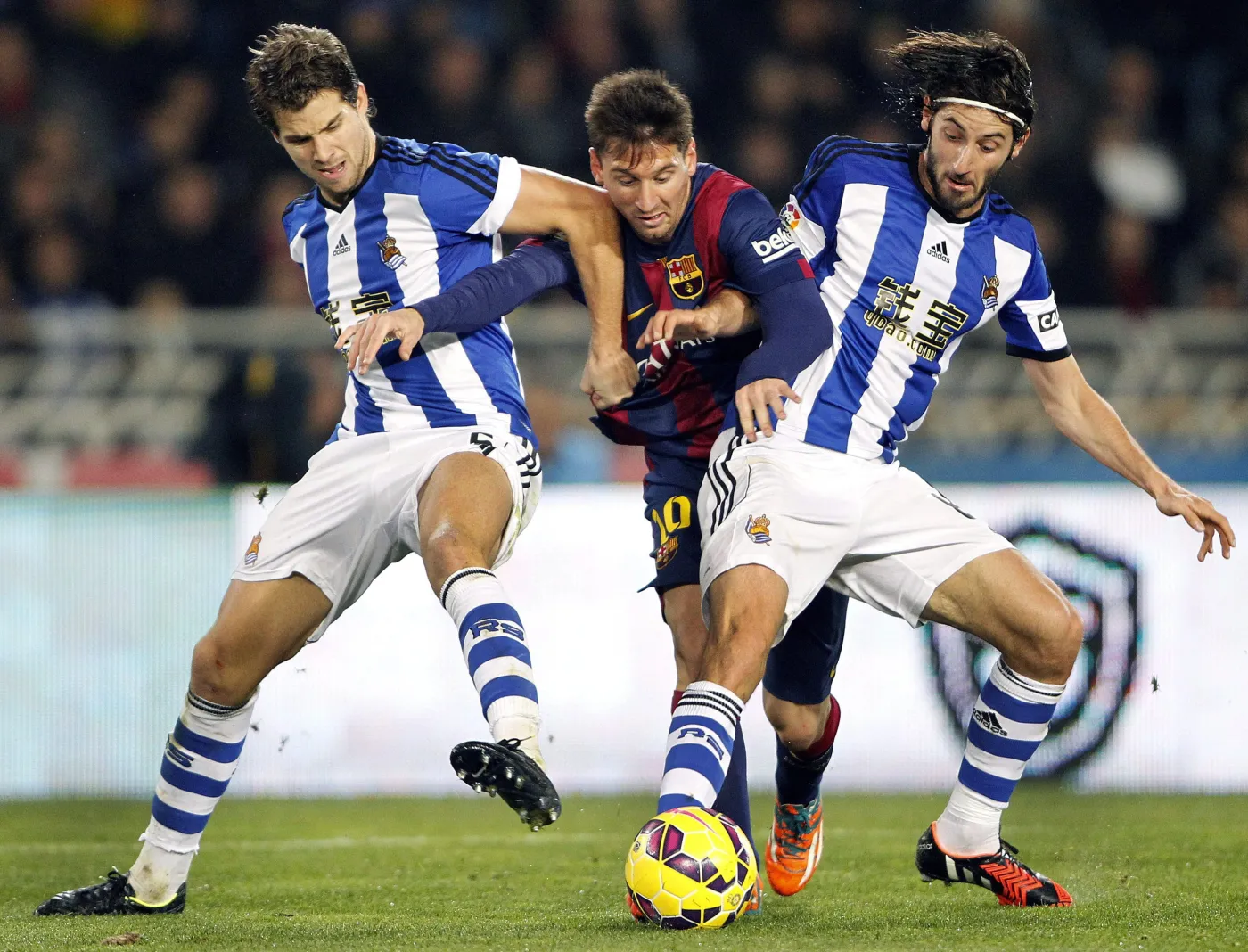 Lionel Messi (w środku)
