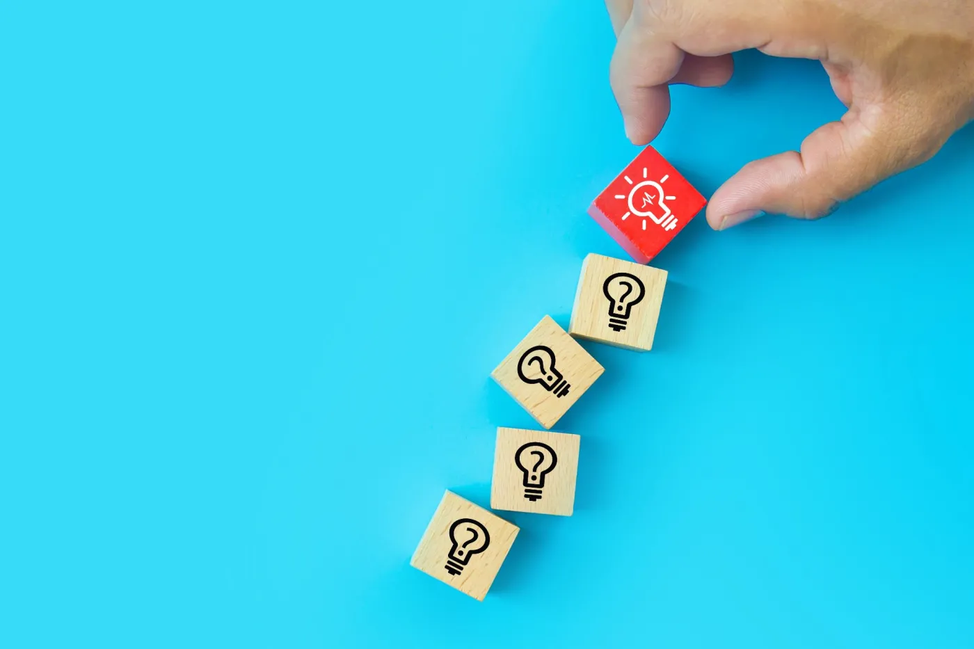 Close,Up,Hand,Choosing,Light,Bulb,Or,Lamp,Icons,On