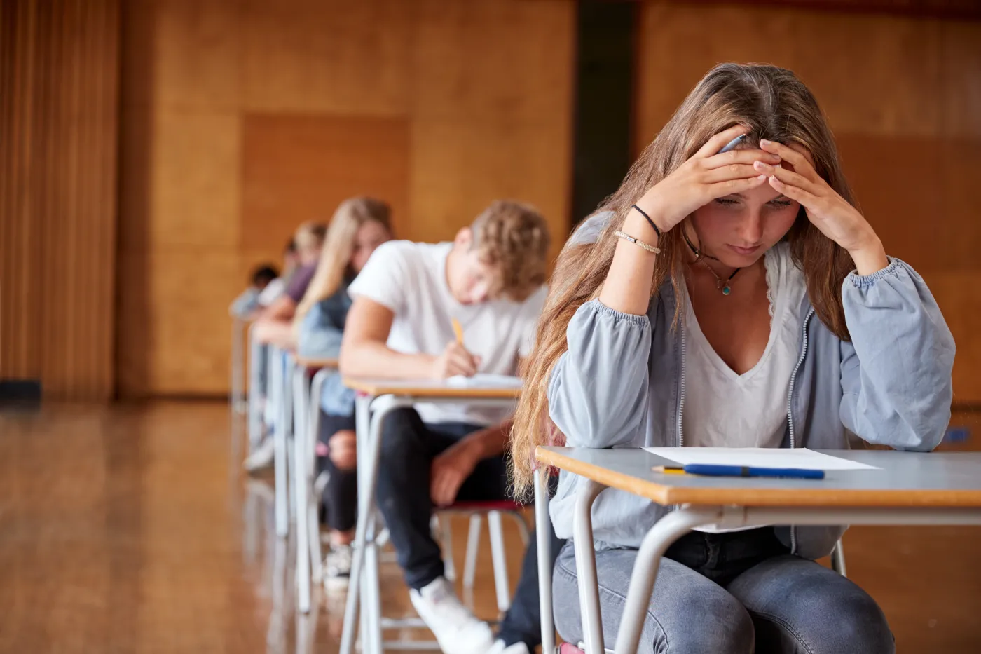 Egzamin ósmoklasisty 8klasisty matematyka Anxious,Teenage,Student,Sitting,Examination,In,School,Hall