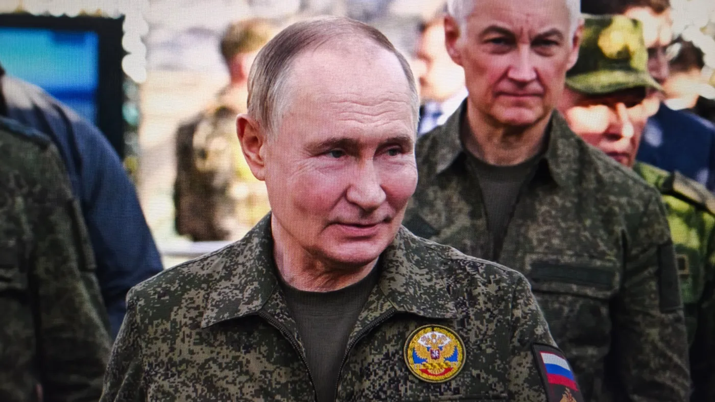 Vladimir,Putin,Is,Seen,On,A,Television,Screen,During,A
