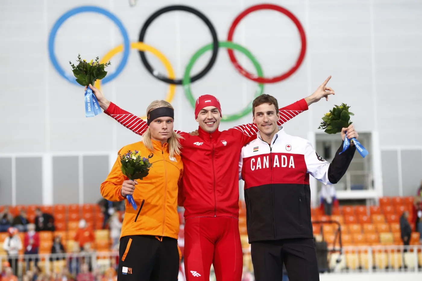 Zbigniew Bródka, Koen Verweij i Denny Morrison na podium