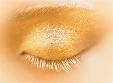 Womans Eyelid with Yellow Eye Shadow --- Image by  Adrianna WilliamszefaCorbis