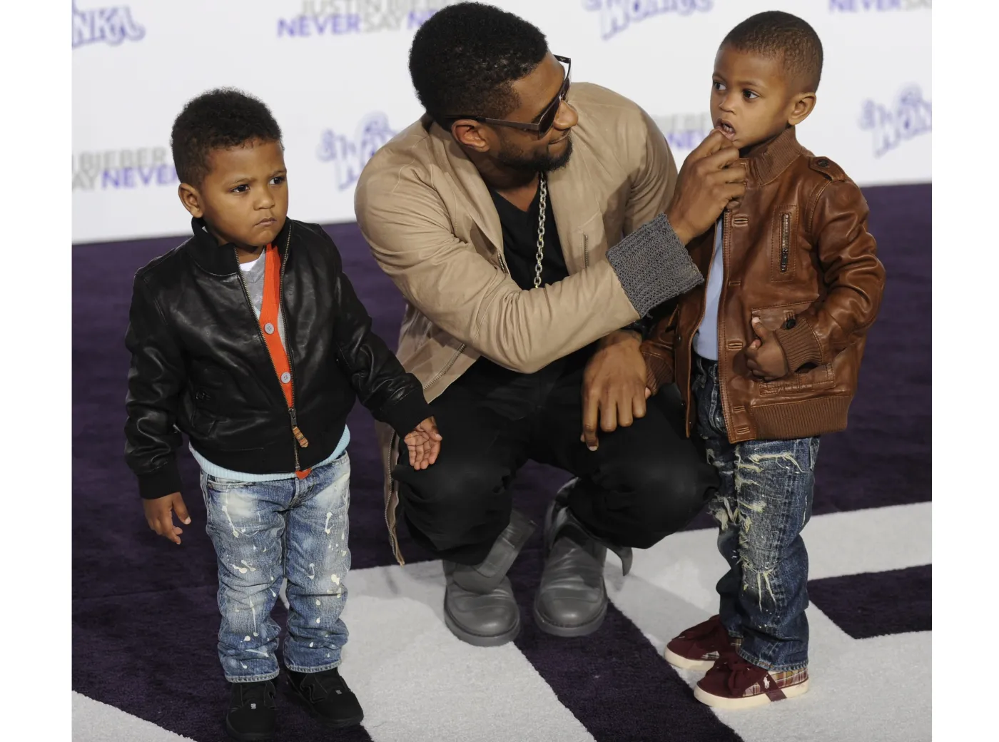 1803760-piosenkarz-usher-z-synami.jpg