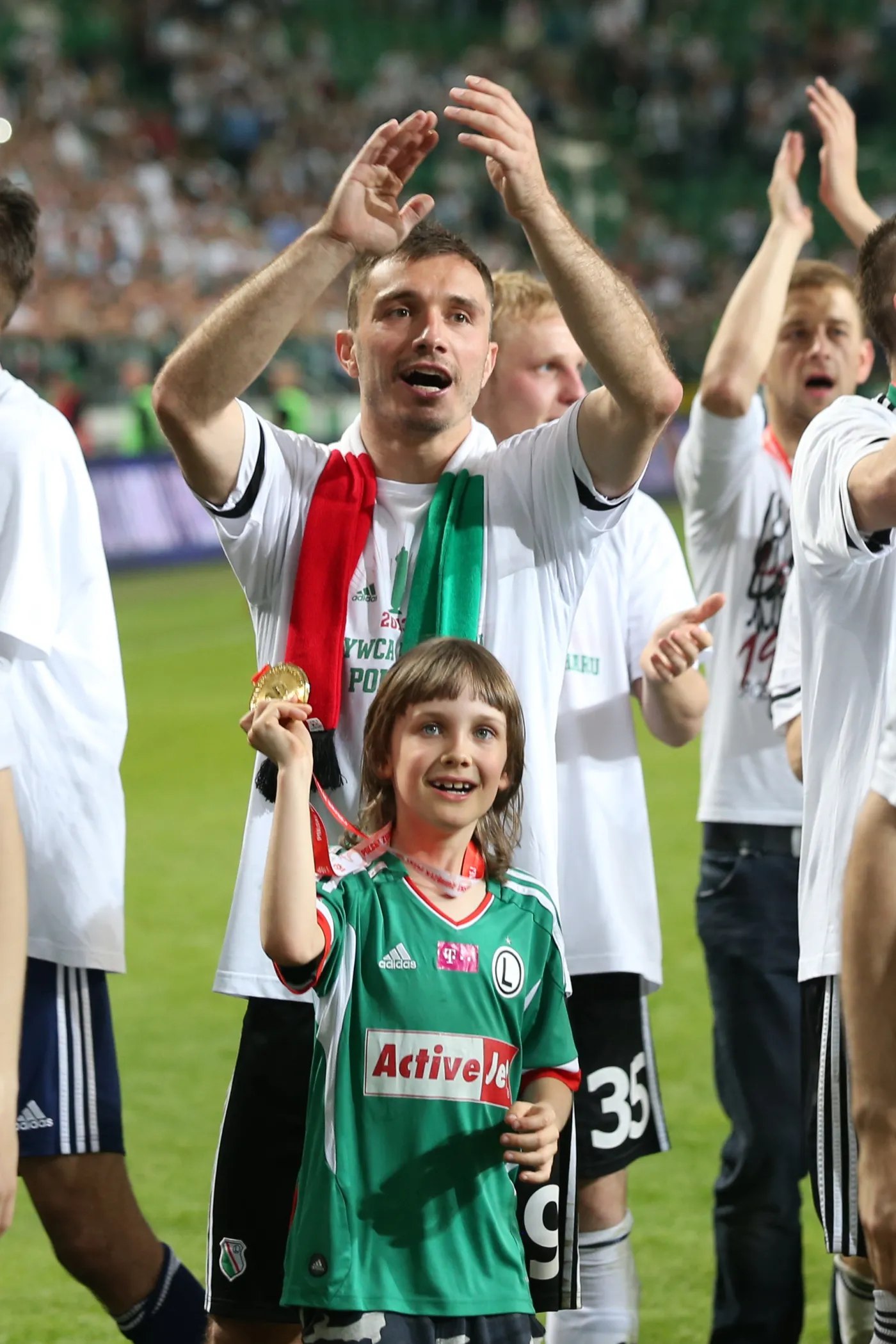 7203365-marek-saganowski-z-synem.jpg