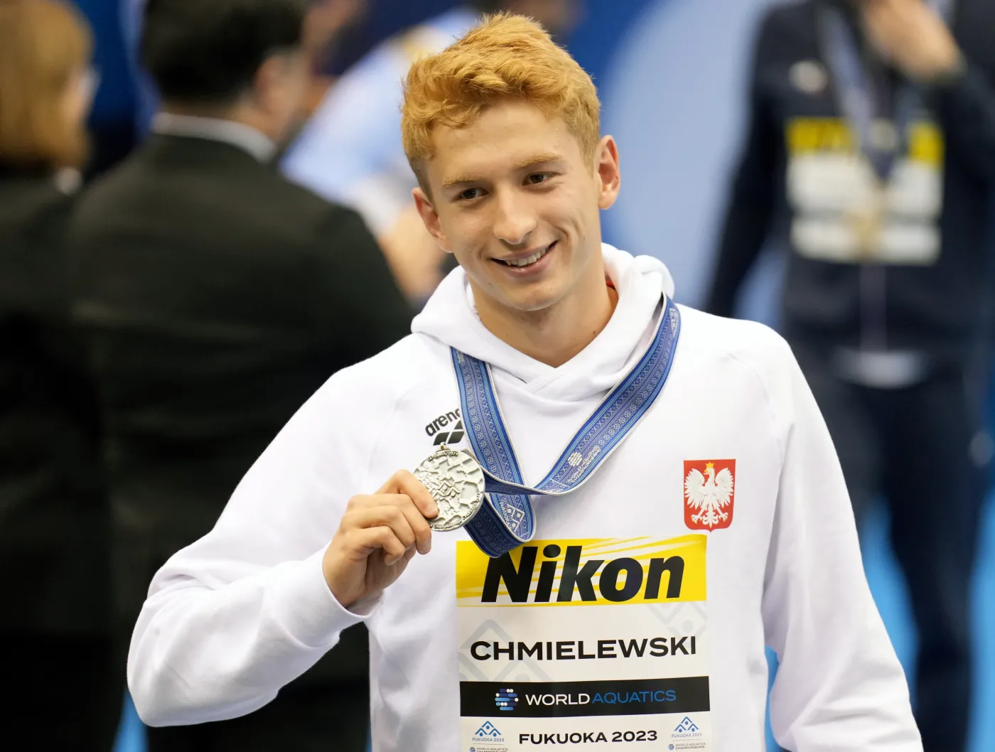 Chmielewski wykorzystał okazję i otrzymał medal od... Phelpsa