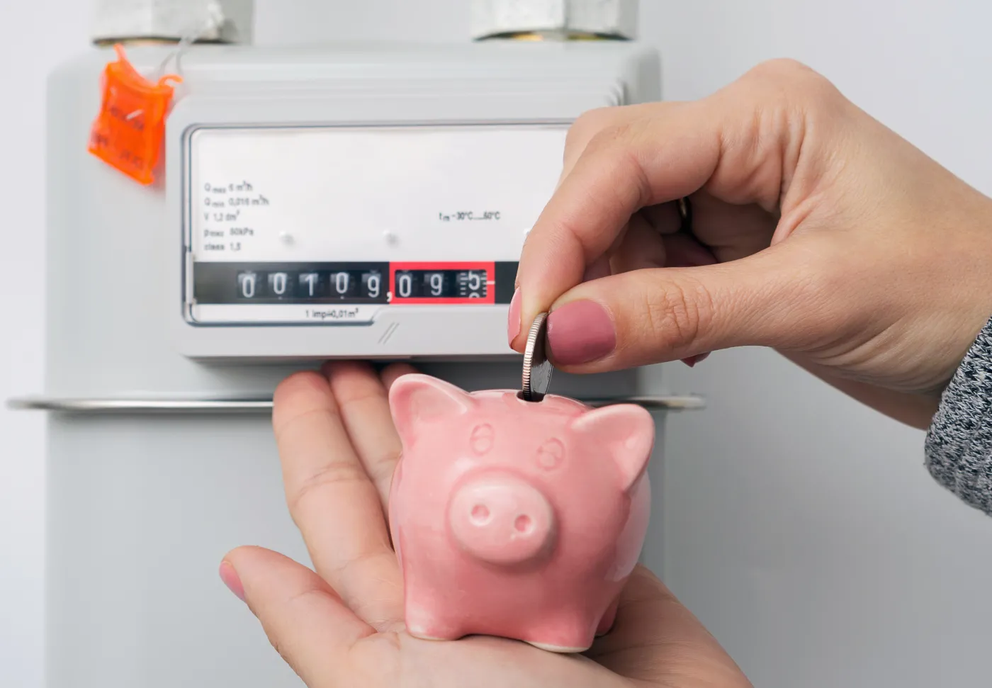 Energy,Saving,Concept.,Piggy,Bank,Near,The,Natural,Gas,Meter