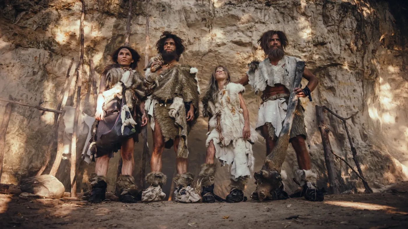 Tribe,Of,Four,Hunter-gatherers,Wearing,Animal,Skin,Holding,Stone,Tipped