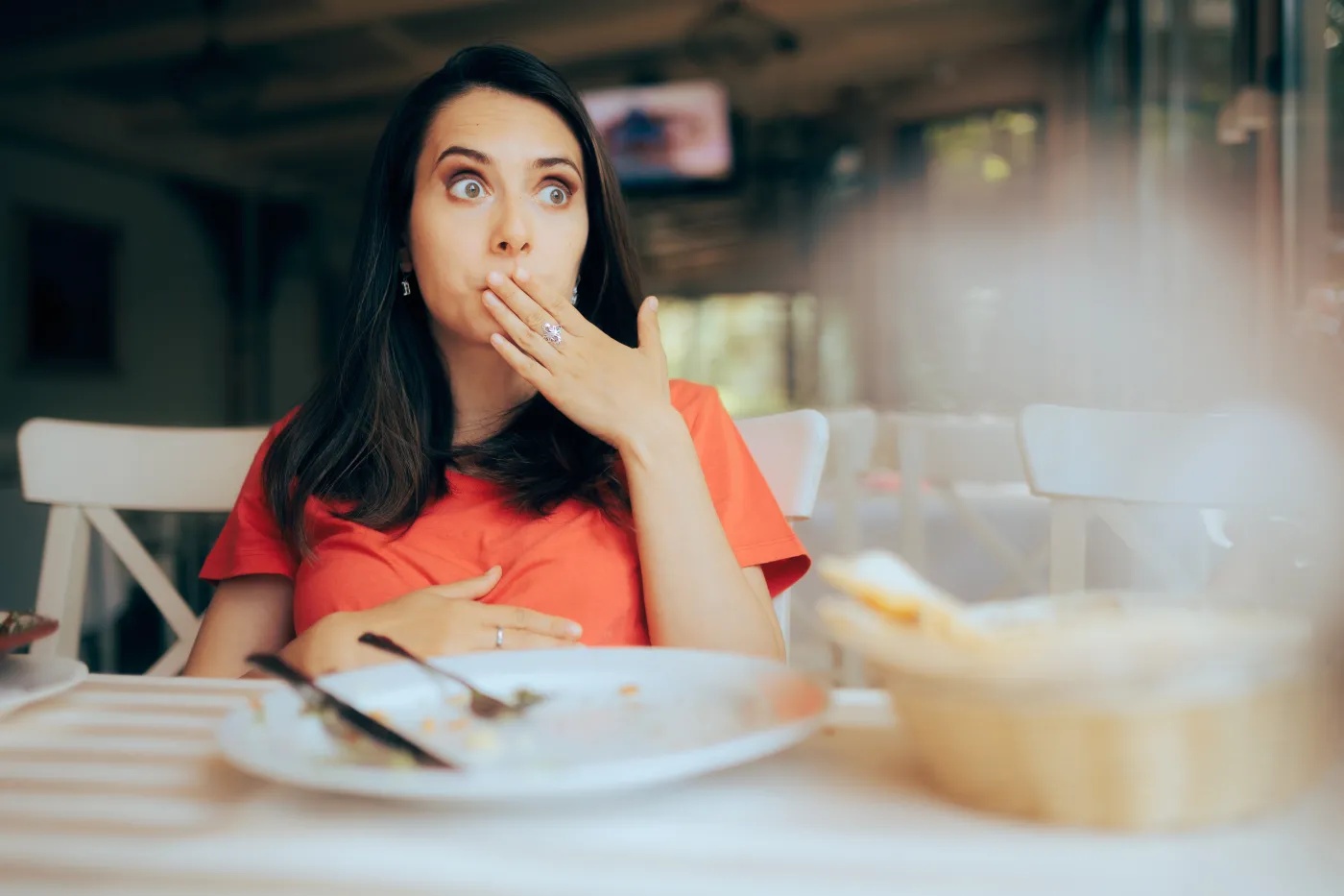 Funny,Woman,Feeling,Full,After,Eating,A,Large,Portion,Of