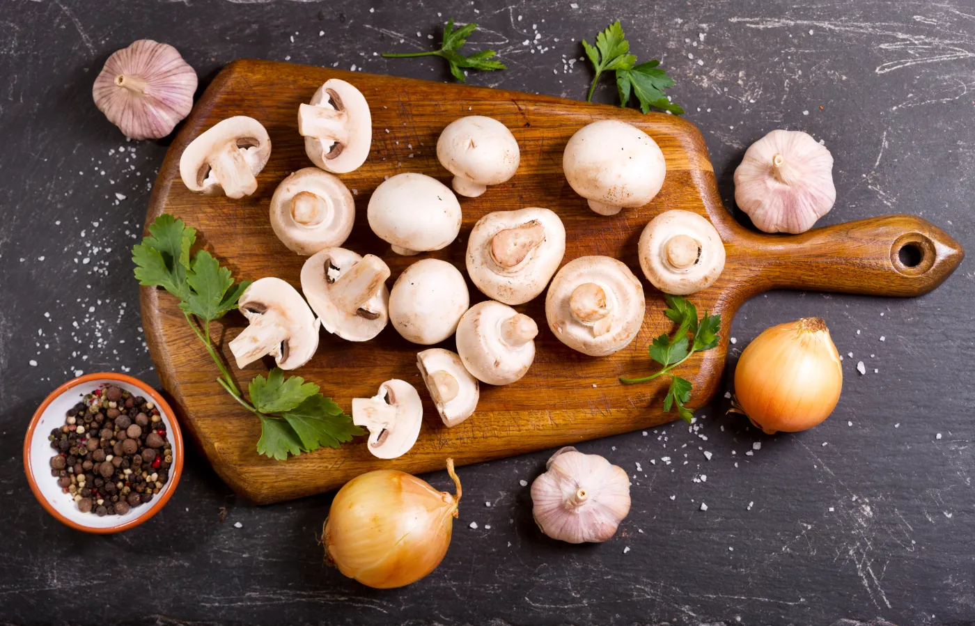 Fresh,Champignon,Mushrooms,With,Vegetables,On,Dark,Table,,Top,View