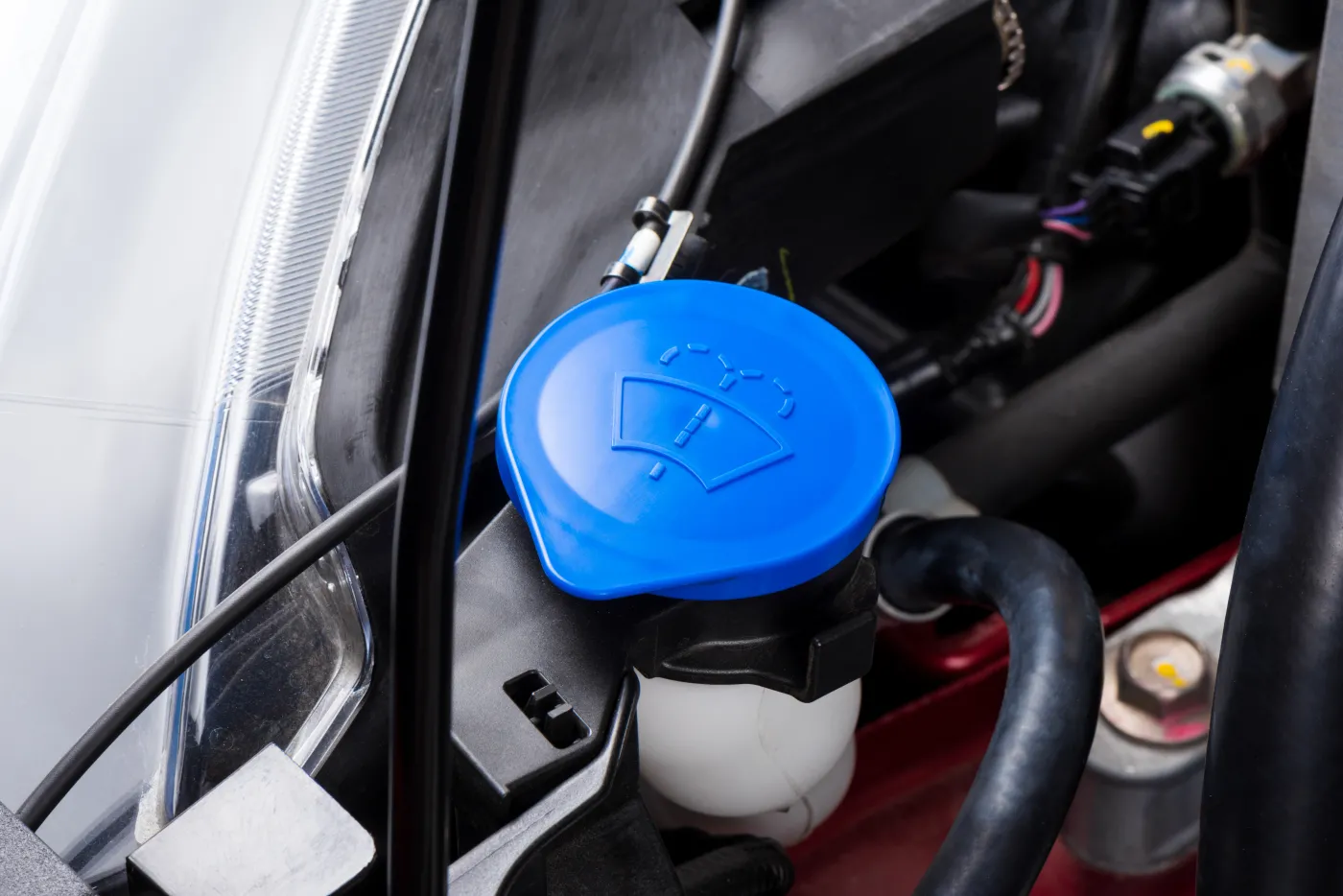 Closeup,Blue,Windshield,Washer,Fluid,Reservoir,Cap,In,Engine,Room