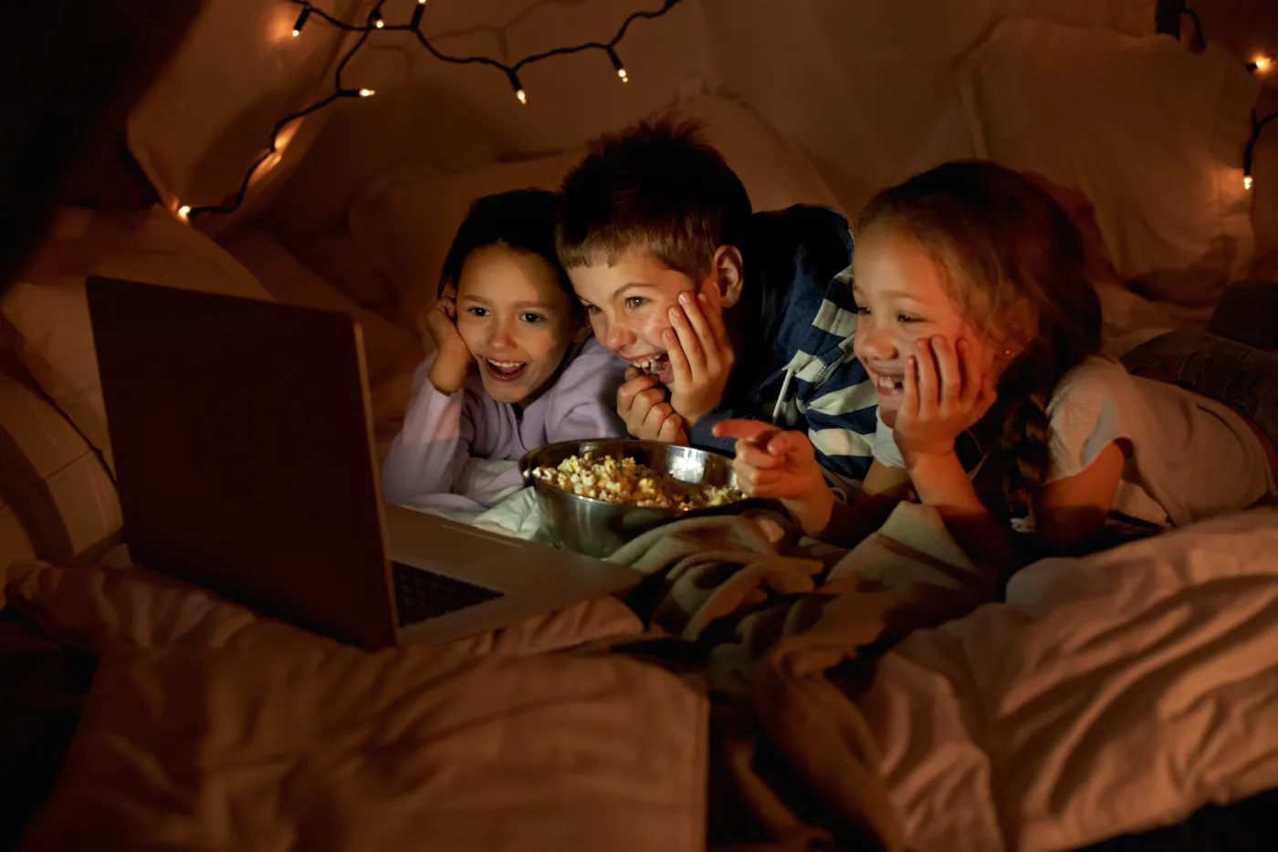 Kids,Are,Never,Far,From,Technology.,Shot,Of,Three,Young