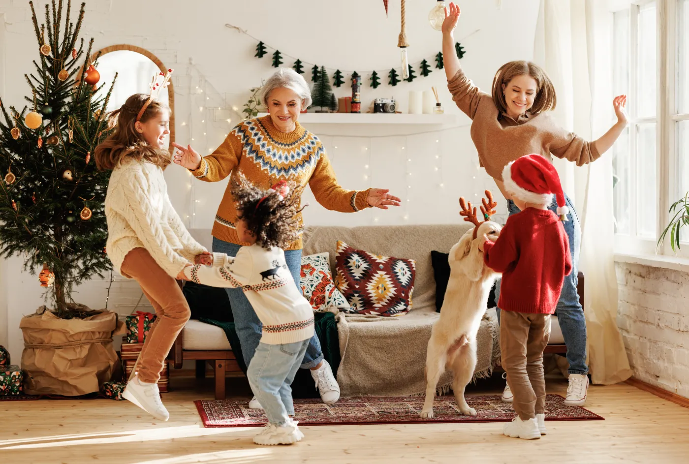 Happy,Positive,Multiracial,Family,With,Three,Kids,And,Golden,Retriever
