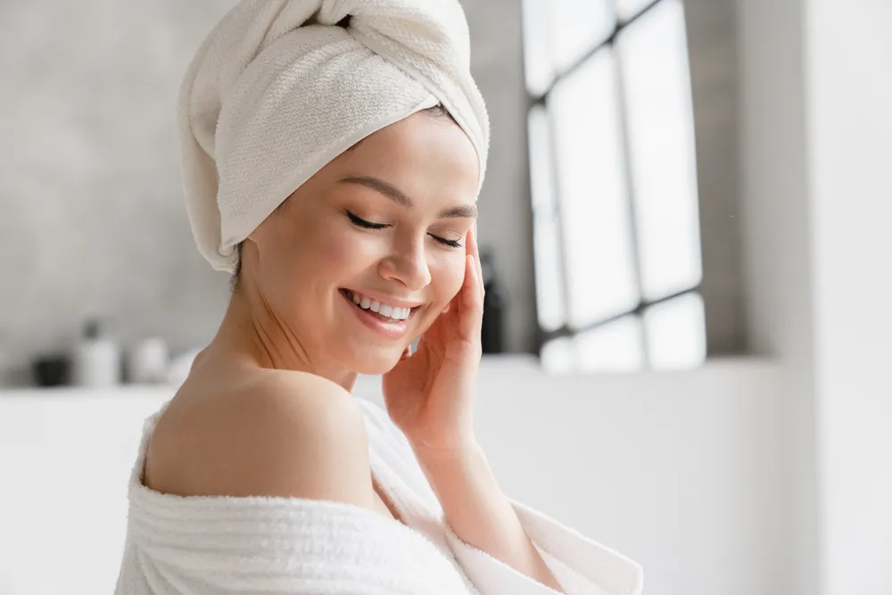 Calm,Serene,Young,Woman,In,Spa,Bathrobe,And,Towel,Relaxing