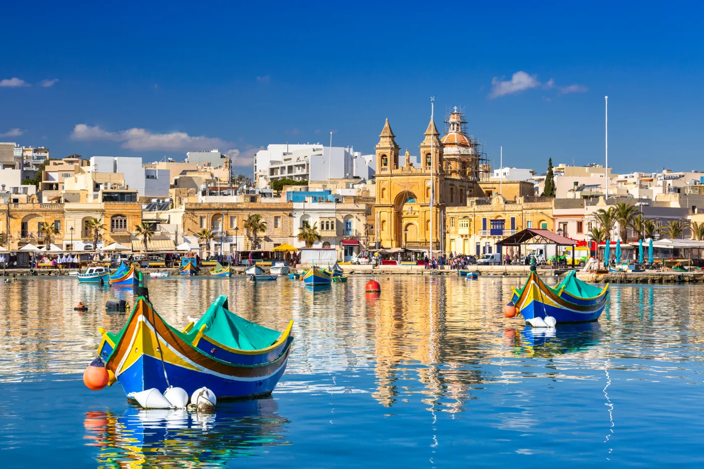 Malta Turystyka Podróże Traditional,Fishing,Boats,In,The,Mediterranean,Village,Of,Marsaxlokk,,Malta