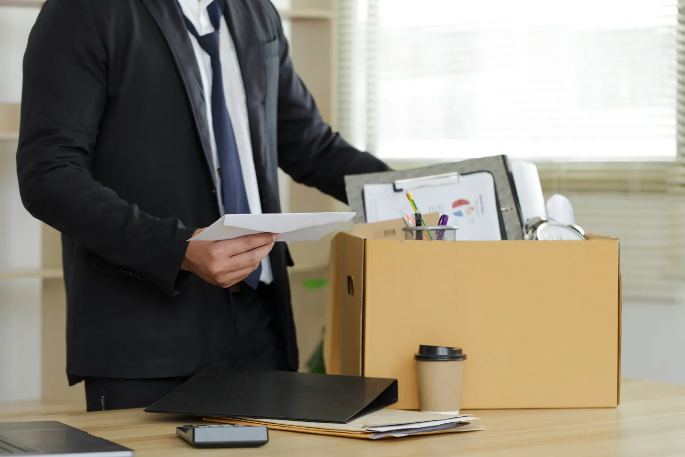 Resignation.,The,Businessman,Puts,His,Box,Of,His,Belongs,On