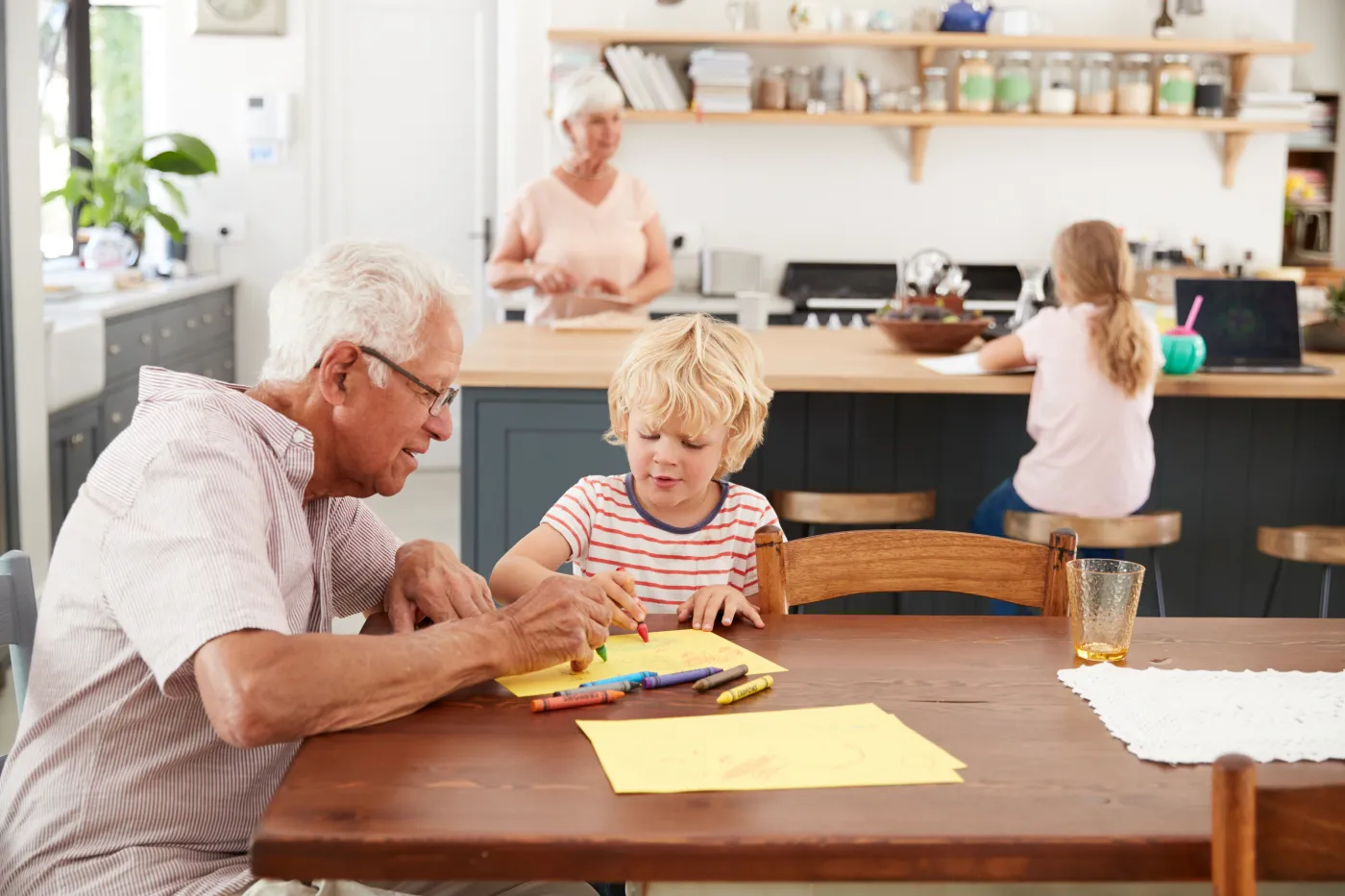 Grandparents,And,Grandkids,In,Family,Kitchen,,Close,Up