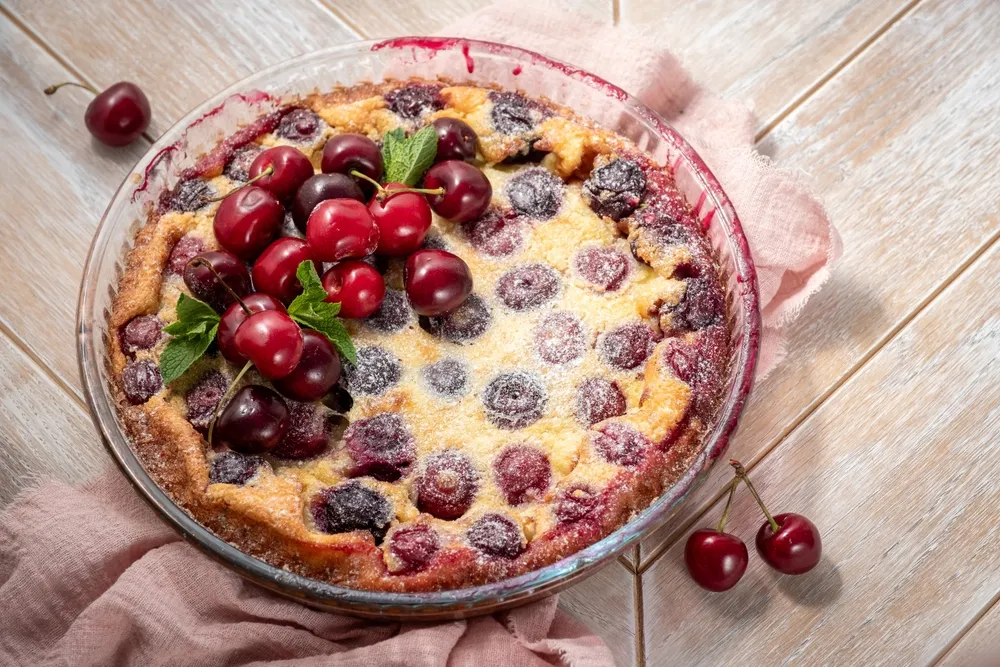 French,Dessert,Cherry,Clafoutis,On,Wooden,Table,,Top,View
