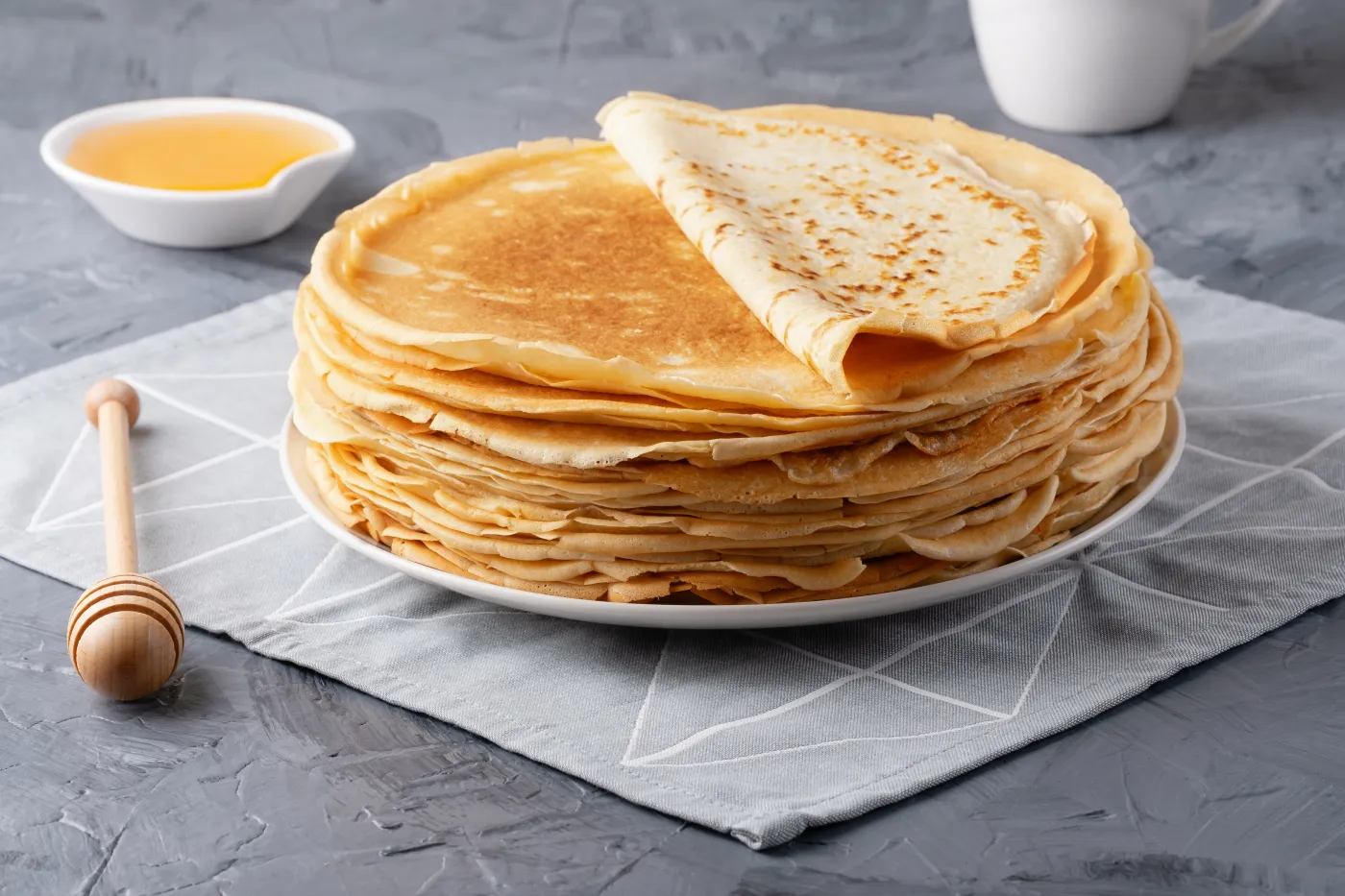 Stack,Of,Traditional,Russian,Pancakes,Blini,On,Gray,Background,With