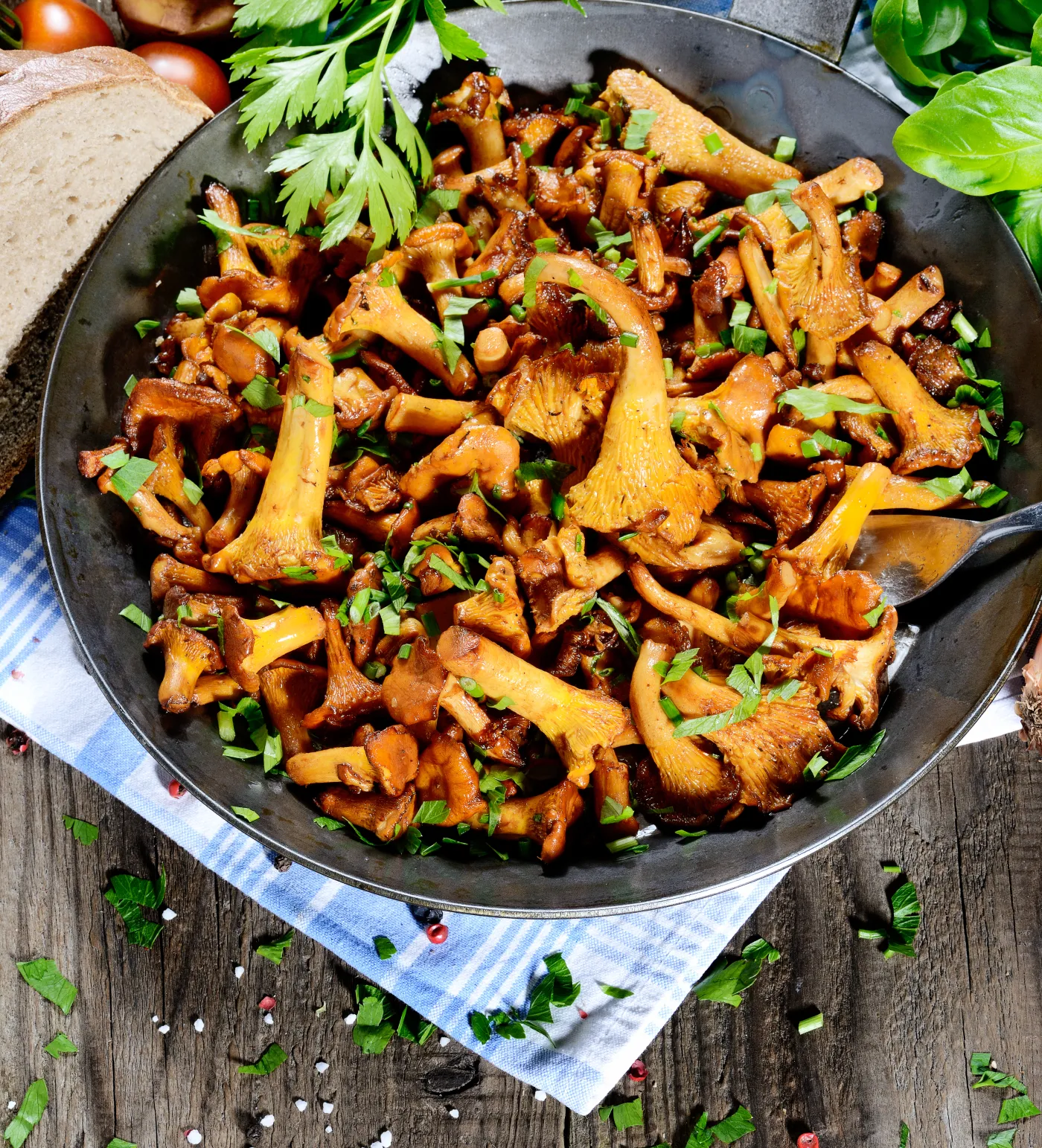 Chanterelle,Mushrooms,On,The,Frying,Pan,With,Fork