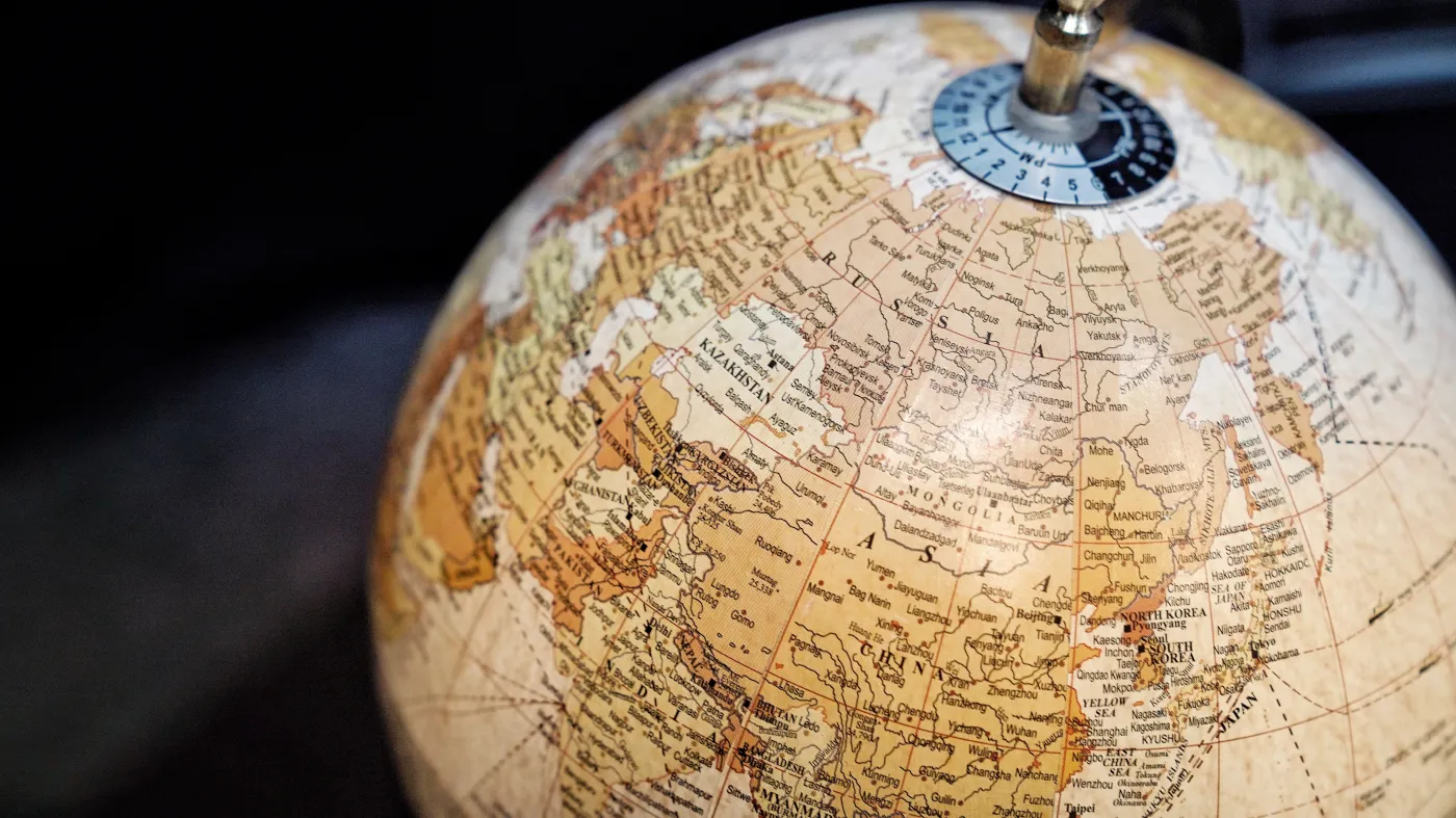 Table,World,Globe,Model,In,Blue,And,Brown,Color,Isolated
