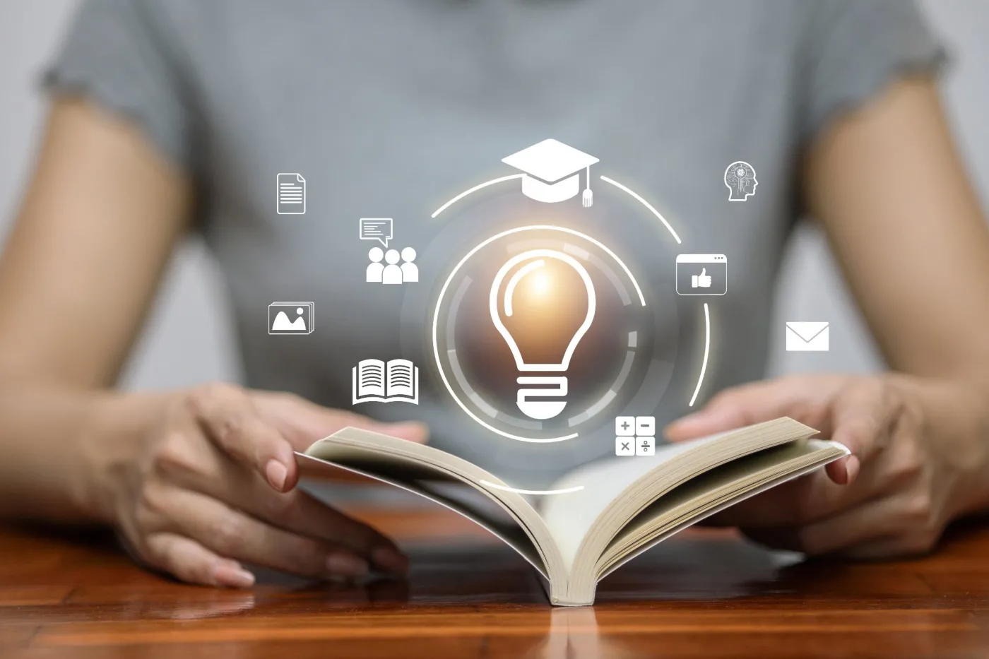 Open,Book,With,Glowing,Lightbulb,And,Education,Icons,,Concept,Of