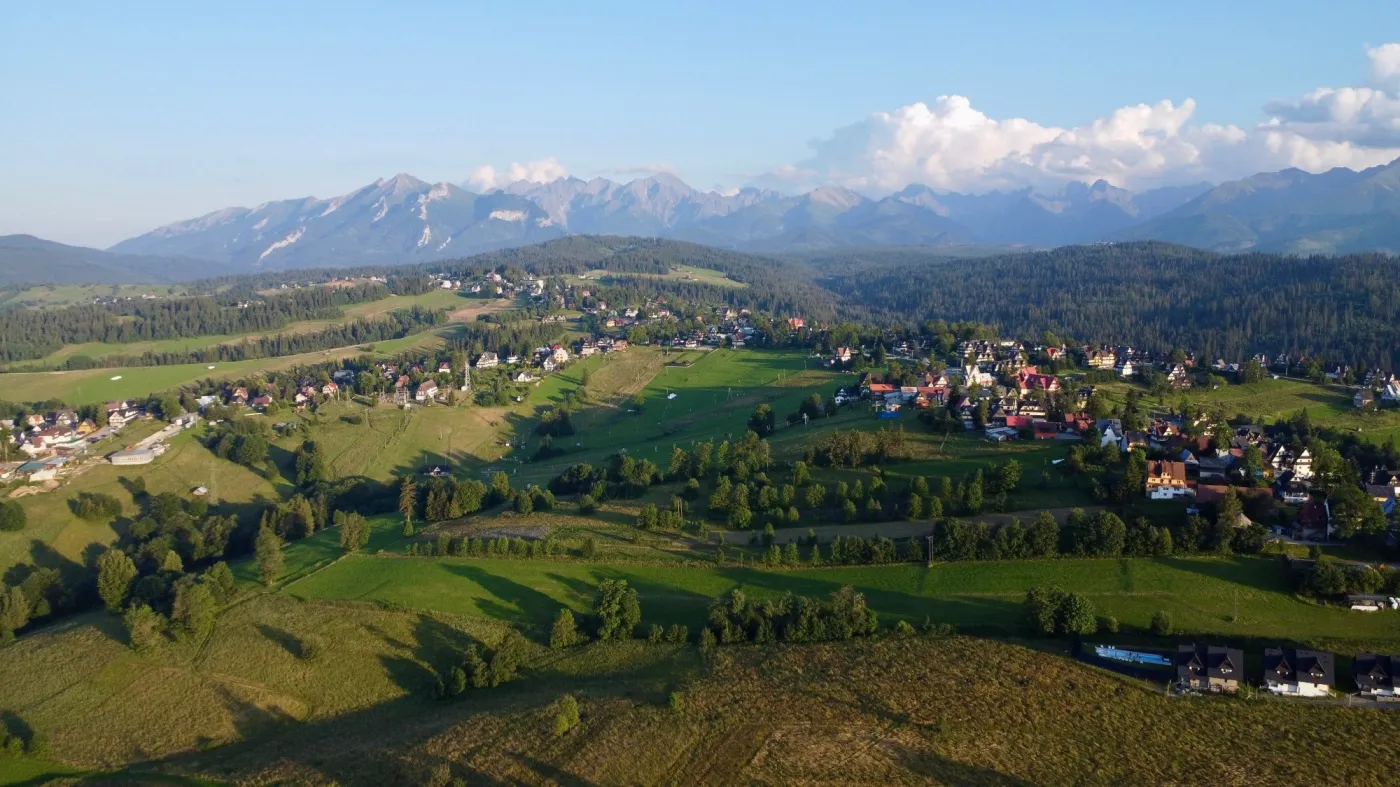 Aerial,View,Of,Rural,Fields,,A,Village,And,The,Tatra