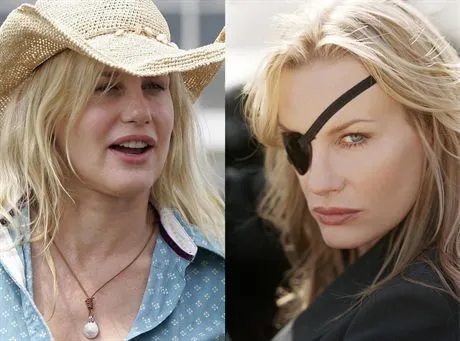 Actress Daryl Hannah, left, talks to Richard Branson, founder of the Virgin Group listens at at the Virgin Festival in Baltimore, Sunday, Aug. 5, 2007. Hannah and Branson demonstrated the eco-educational exhibits on the grounds of the festival.  AP PhotoJeff Christensen