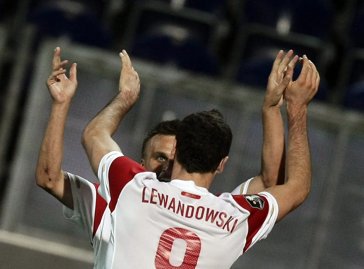 Robert Lewandowski i Sławomir Peszko po zdobyciu drugiego gola