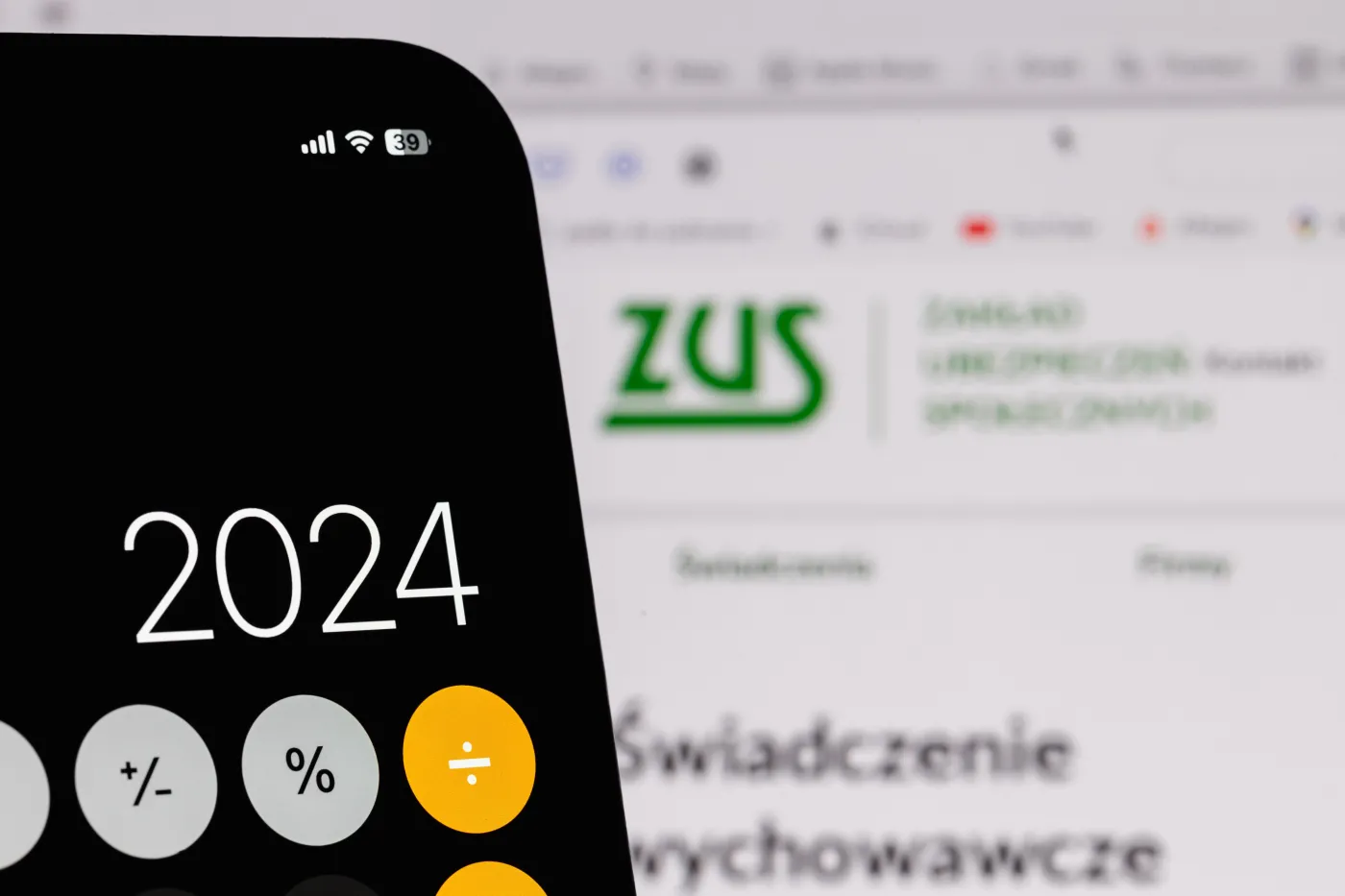 ZUS Zakład Ubezpieczeń Społecznych Warsaw,,Poland,-,20,11,2023:,Smartphone,With,The,Calculator