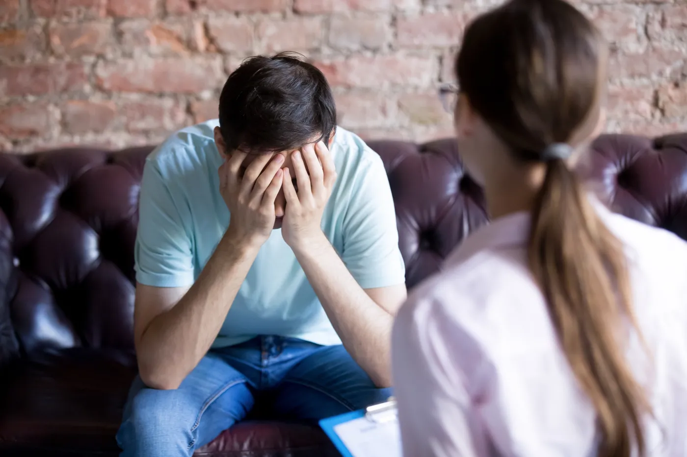 Young,Male,Visits,Psychologist,Counselor.,Unhappy,Client,Covered,Face,With