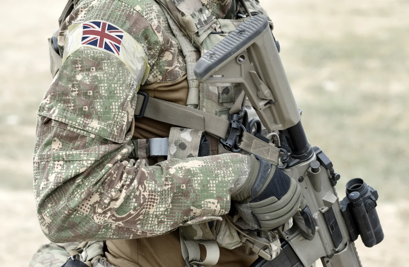 Soldier,With,Assault,Rifle,And,Flag,Of,United,Kingdom,On